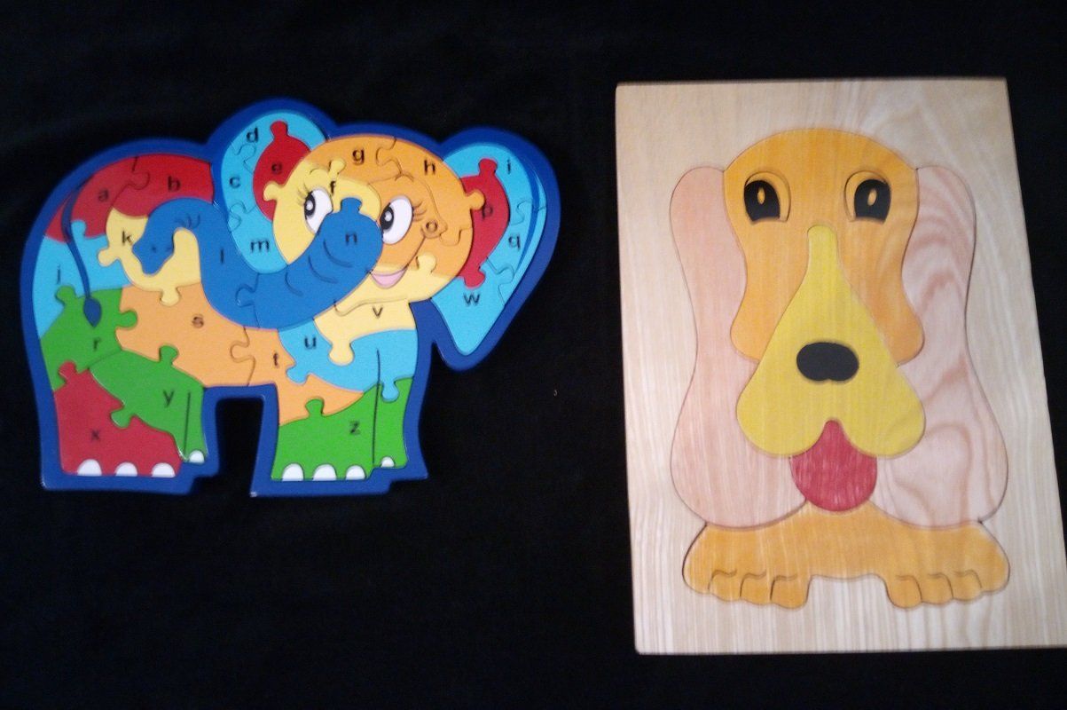 Puzzle: 2 Holzpuzzle Elefant mit ABC & Hund – Usato da Werdenberg venduto da EXA-Secondhand