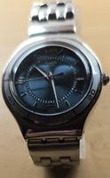Montre Swatch bleue bon état