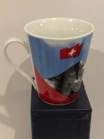 Tasse en porcelaine souvenir drapeau Suisse et montagne