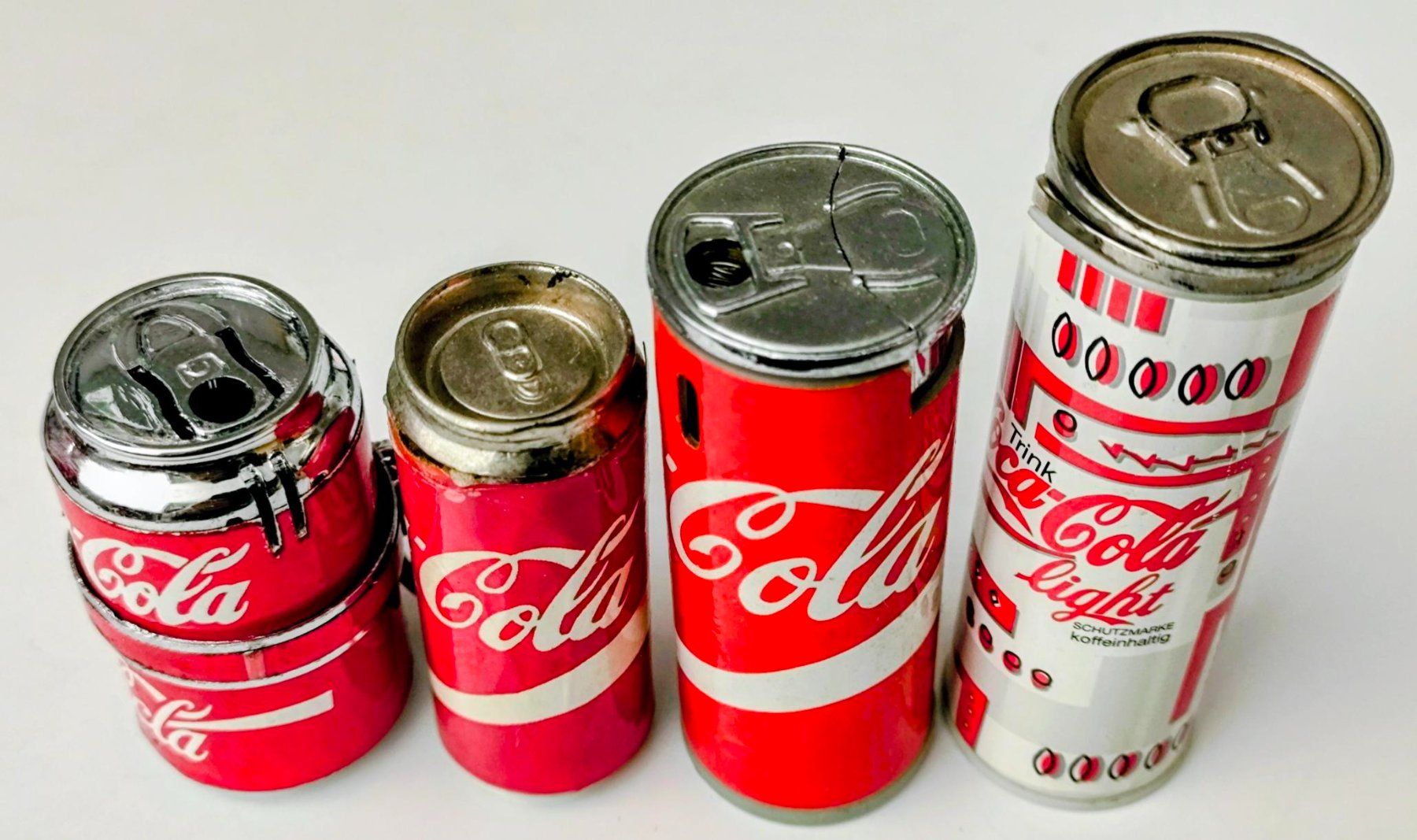 Briquets: 4 alte Coca-Cola Feuerzeuge – D'occasion à Pfäffikon ZH par Colacity