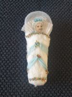 ANTIKER CHRISTBAUMSCHMUCK WATTE KIND MIT OBLATE