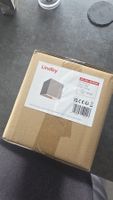LED-Wandleuchten aus Gips (grau/beige)