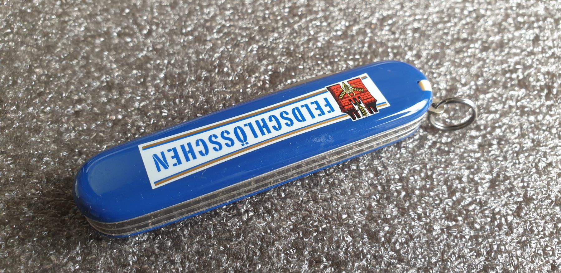 Victorinox Coltelli tascabile: Victorinox Feldschlosschen Blau Bier Sackmesser – Usato da Val D Illiez venduto da SnowRoof 1