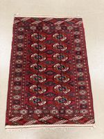 Orientteppich rot mit geometrischem Muster gebraucht