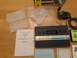 Atari 2600 Konsole OVP + viel Zubehör Beihefte + Spiele