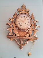 Ancienne horloge murale en bois doré