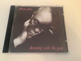 Elton John / sleeping with the past. / 1989