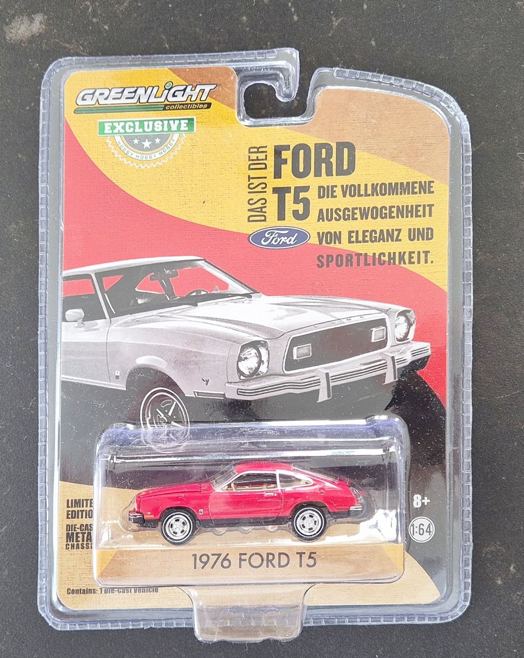 Greenlight Modellini d'auto: 1976 Ford T5, Mustang II Hatchback, Greenlight 1/64 – Nuovo e nell'imballaggio originale da Zuzwil SG venduto da Peranacapri 1