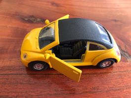 Gelber VW New Beetle Modellauto Türen öffenbar
