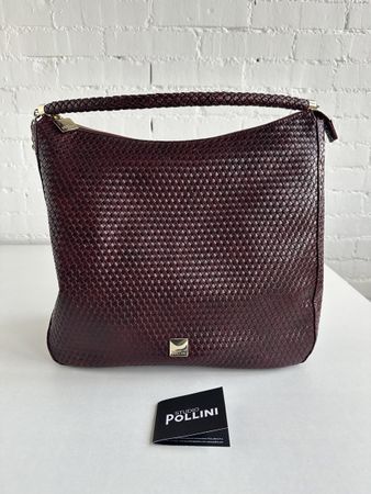 Geflochtene Handtasche in einem dunklen Weinrot von Pollini