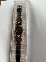 Getragene und nicht getragene Swatch Uhren
