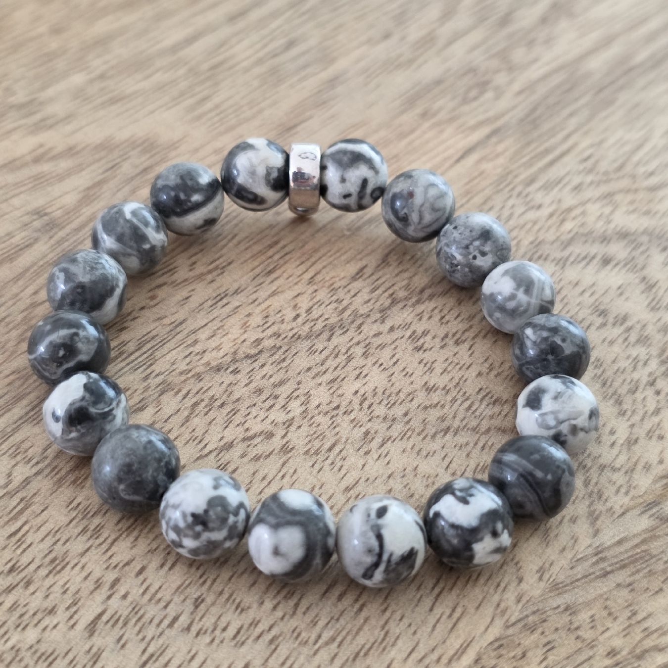 Bracciali & Braccialetti: Armband Stein Perlen Grau Weiss – Usato da Rheinsulz venduto da Gilea