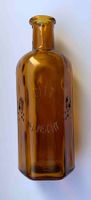 kleine alte Giftflasche aus braunem Glas