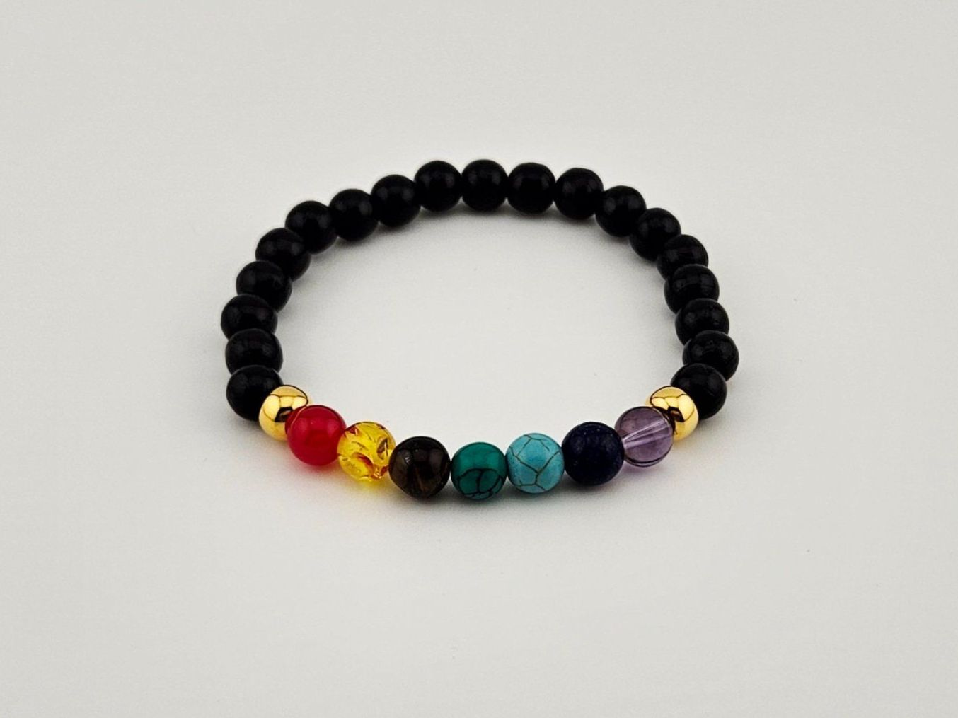 Bracciali & Braccialetti: Chakra-Armband Holzperlen Chakra-Steine Goldperlen – Nuovo e nell'imballaggio originale da Thalwil venduto da Seasons-Schmuck 1