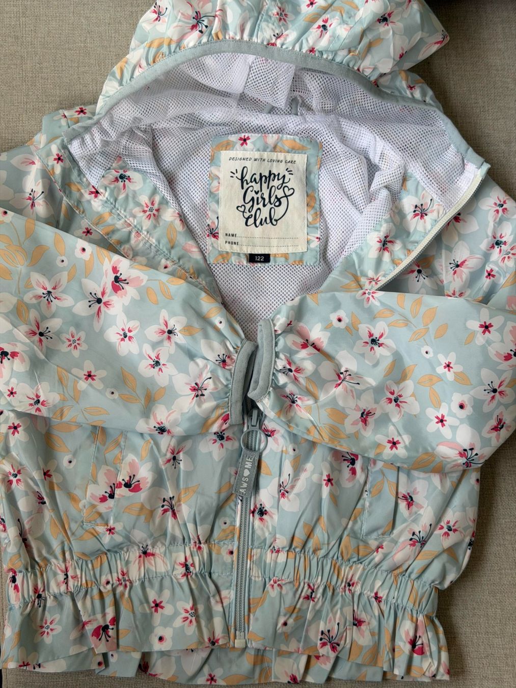 Giacche & Cappotti: Hellblaue Kinder-Windjacke mit Blumenmuster (Größe 122) – Usato da Frauenfeld venduto da geo_rpd9 4