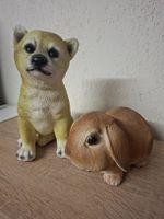 Statuen Figuren Hund und Kaninchen