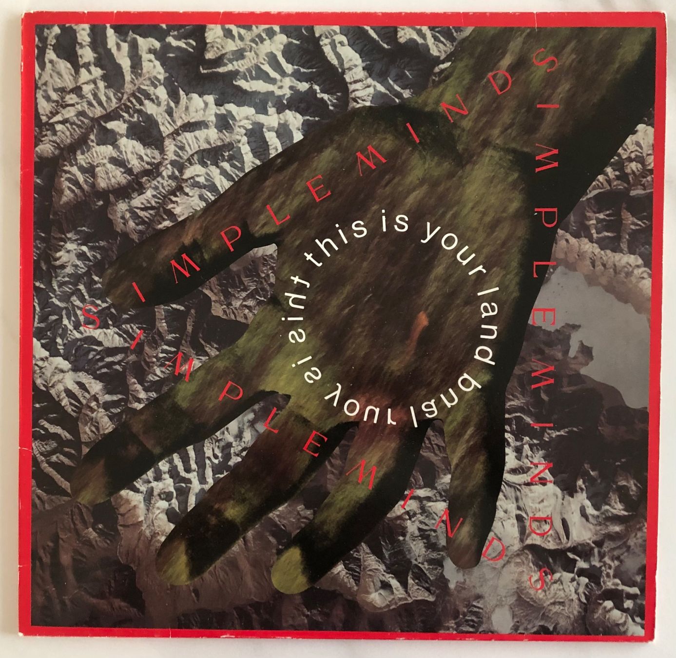 Vinyles: SIMPLE MINDS - THIS IS YOUR LAND – D'occasion à Poliez-Pittet par Newtown-Records