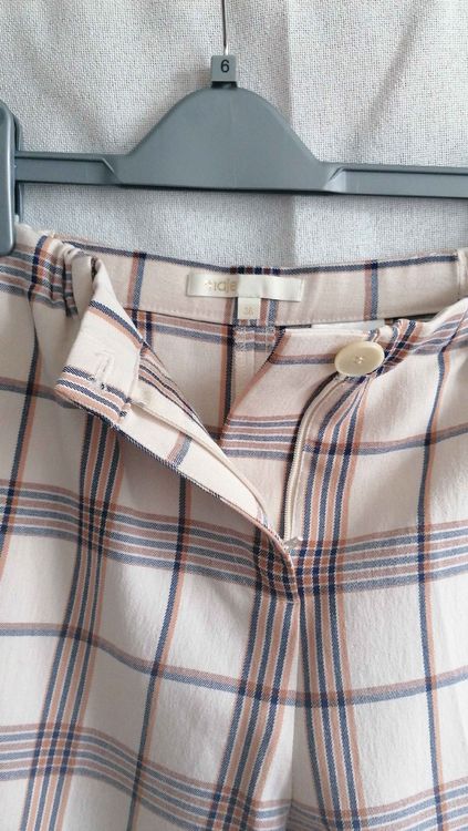 Pantalon à carreaux avec chaine