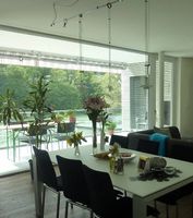 Design-Pendelleuchtensystem von Licht im Raum
