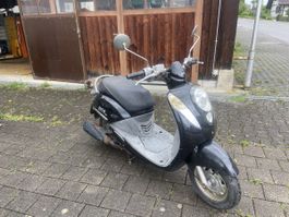 Sym Mio 100 