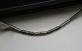 Halskette , Carl Dau Berlin , Gold , Silber + Stahl .