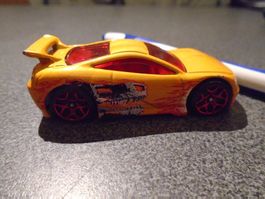 Spielzeugauto gelb, Bild