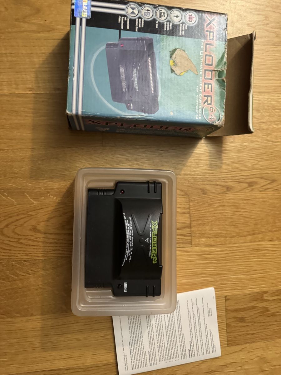 Nintendo Spiele: Xploder n64 cheat cartdridge + code book – Gebraucht aus Ostermundigen von RetroOwl 2