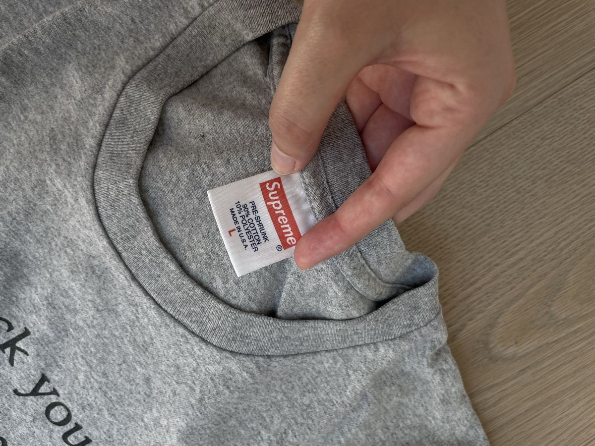 Supreme T-Shirts: Supreme T-Shirt Grau mit Spruch, Grösse L – Gebraucht aus Birmensdorf ZH von nin.am 2
