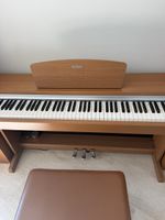 Yamaha E-Piano inkl. passendem Klavierstuhl