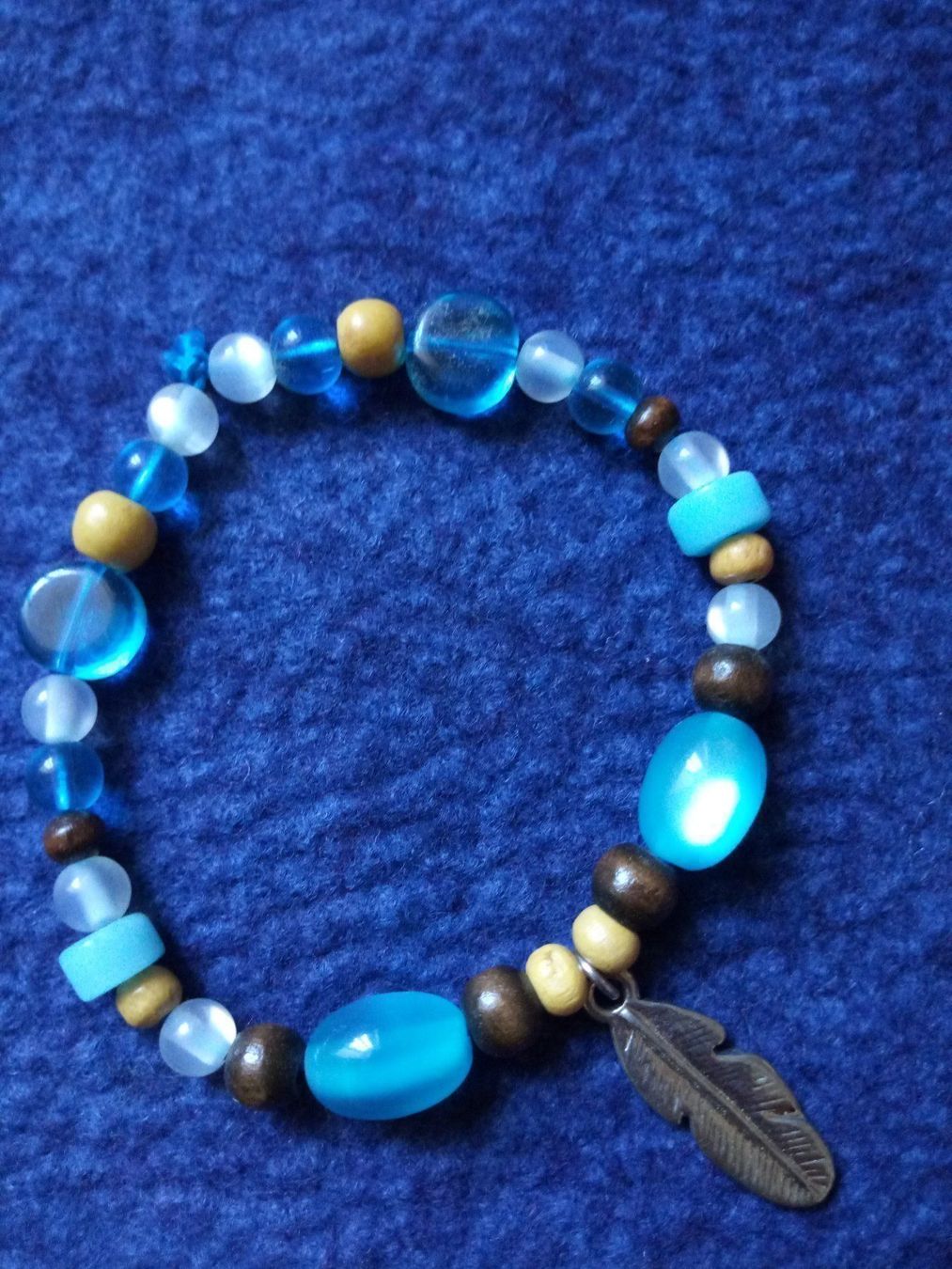 Bracciali & Braccialetti: Modeschmuck/Armband mit Federanhänger – Nuovo (secondo la descrizione) da Beckenried venduto da Havacola 5
