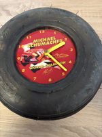 Michael Schumacher Wanduhr im echten Kartreifen 