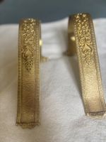 Paire d’embrasses de rideaux en laiton