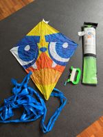 Kids kite... clip in the handle, unfold the kite... and go!