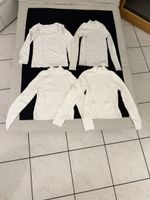 Lot de 4 hauts blancs à manches longues femme taille 140.