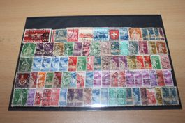Schweiz - 83 Briefmarken gestempelt + 24 Briefausschnitte