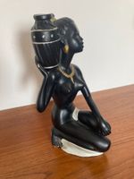 Dekofigur Frau mit Krug schwarz