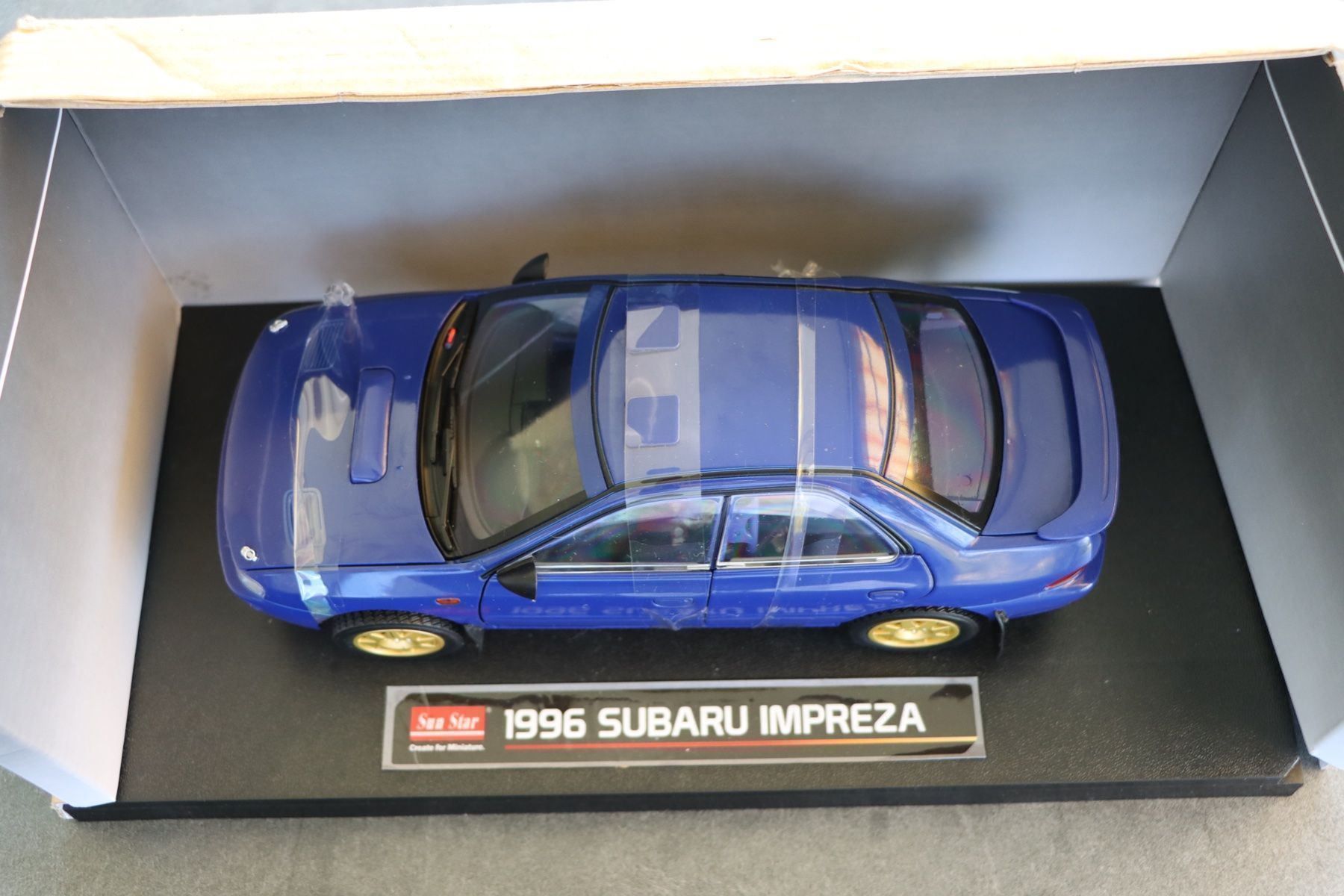 Subaru Modellini d'auto: Subaru Impreza 1996 1:18 SunStar – Nuovo e nell'imballaggio originale da Bühl b.Aarberg venduto da modelldiecast 5