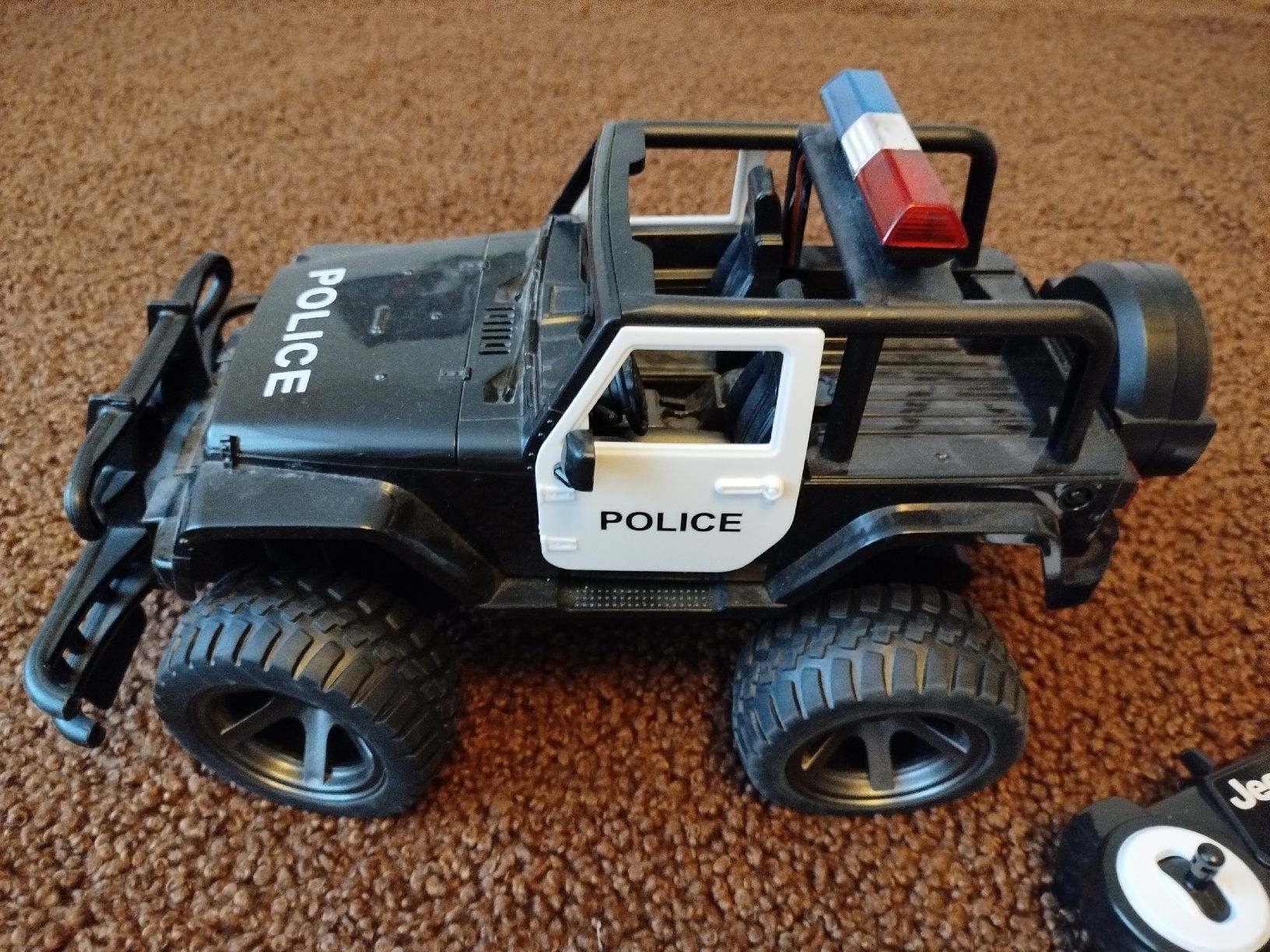 Spielzeuge: Polizei Jeep, ferngesteuert. Top Zustand – Gebraucht aus Naters von oks_6rfv 1