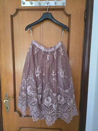 New elegant skirt. Gr. 34/XS