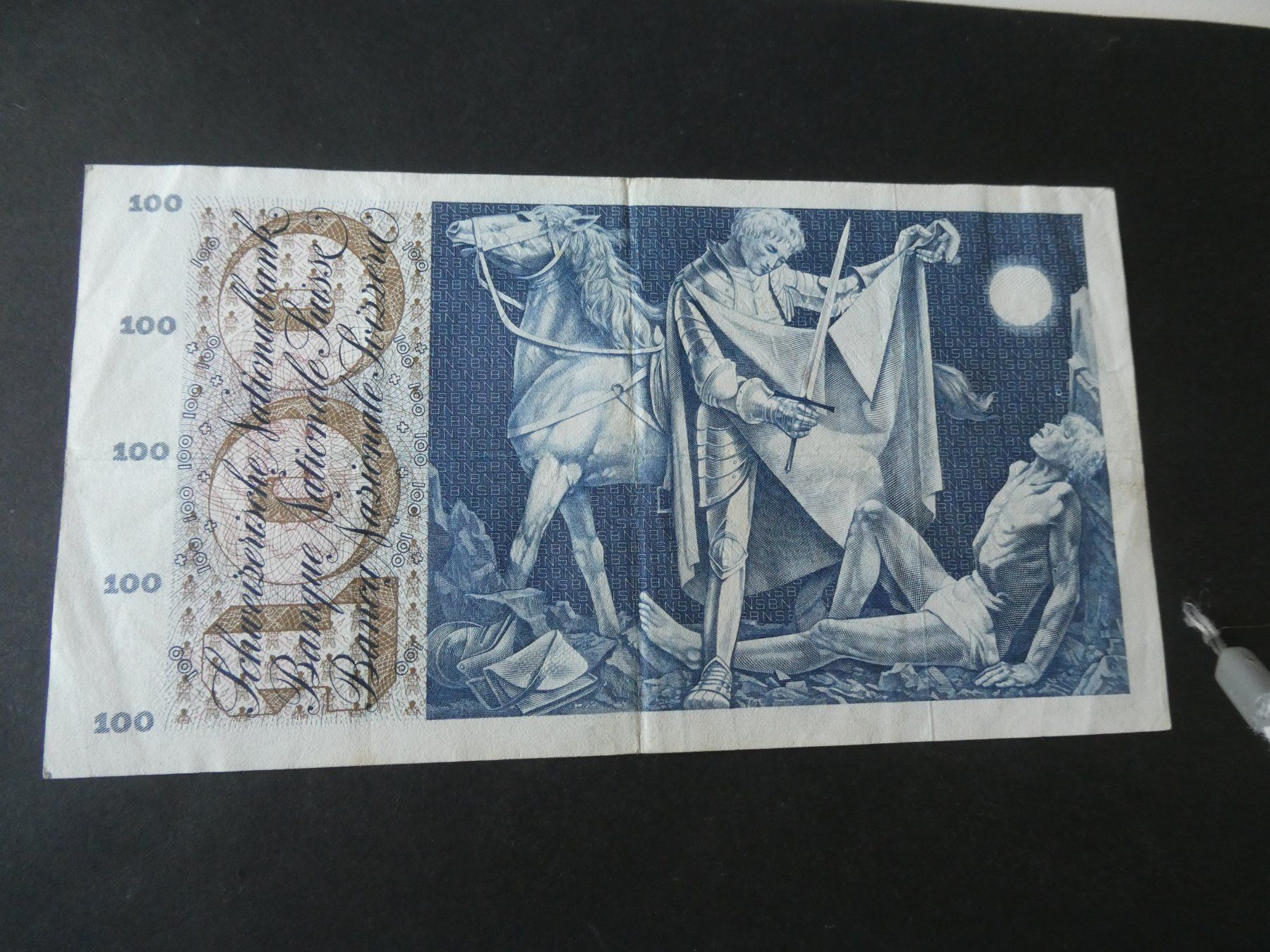 Banknoten: Schweiz 1961,  100 Franken – Gebraucht aus Hinterforst von Rohusri 1