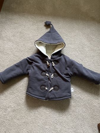 Une  veste neuve pour enfant 100cm