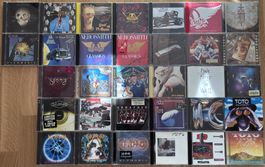 32 Rock CDs (Def Leppard, Aerosmith, Toto...)