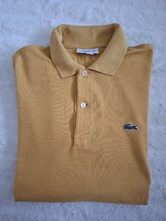 Polo Lacoste jaune moutarde taille 3, très bon état 