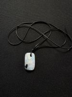 Mondstein mit Turmalin, Cabochon, 34.10ct, 26.5x16.5 mm