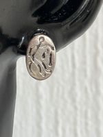 Jolis clous d'oreilles en argent 925 avec motif tribal.