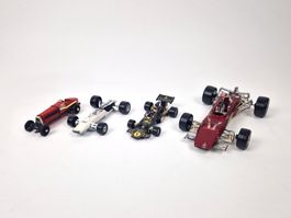 Vier F1 Modellautos (Ferrari/Fiat/Honda/Lotus)