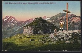 Eben-Alp, Bauer und Junge am Gipfelkreuz