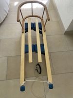 Schlitten mit Kindersitz