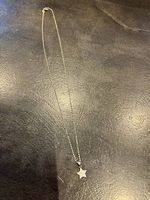 Chaîne en or pendentif étoile