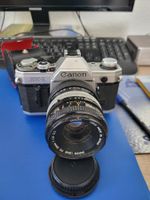 Canon AE1 + 50 mm + Brennweitenve. Für analoge Fotografie